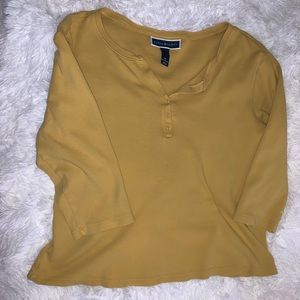 yellow button up shirt